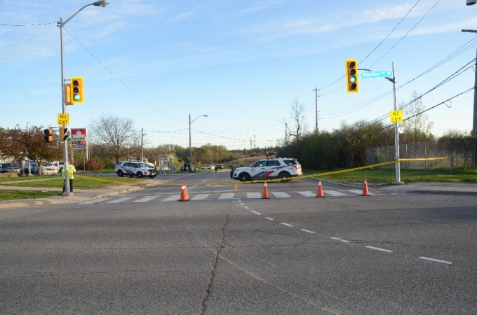 The Collision scene is located in the centre of the photo, just past the two parked police cruisers.