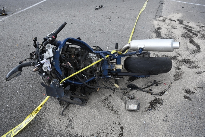 Figure 1 - The Kawasaki motorcycle with damage to the entire vehicle.