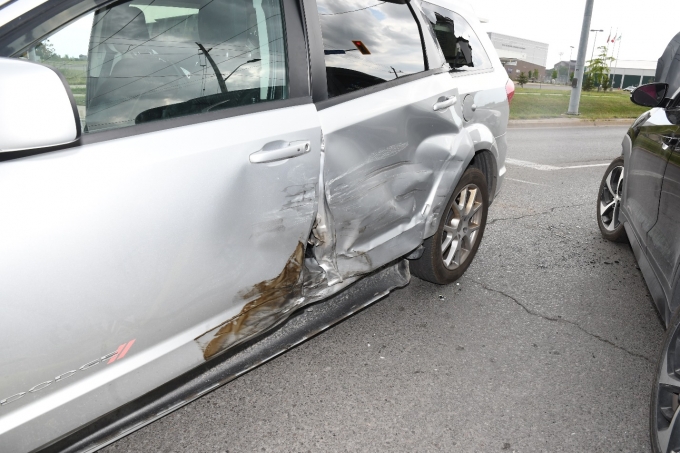 Figure 3 - The Dodge Caravan with damage to its driver’s side.