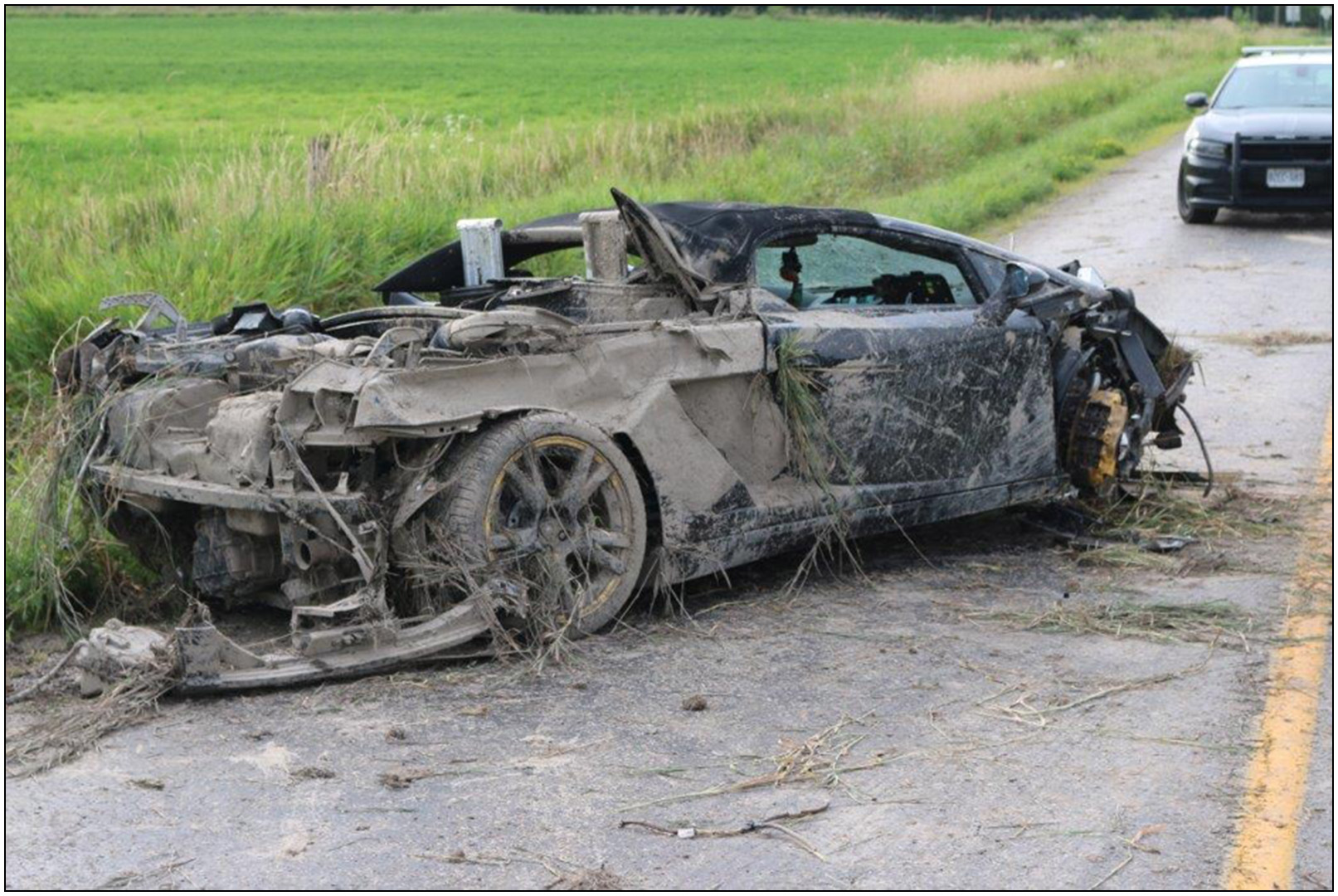Photos of damaged Lamborghini at scene