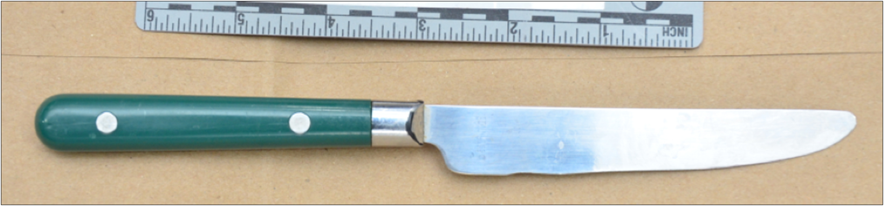 photo of the knife seized from the bedroom