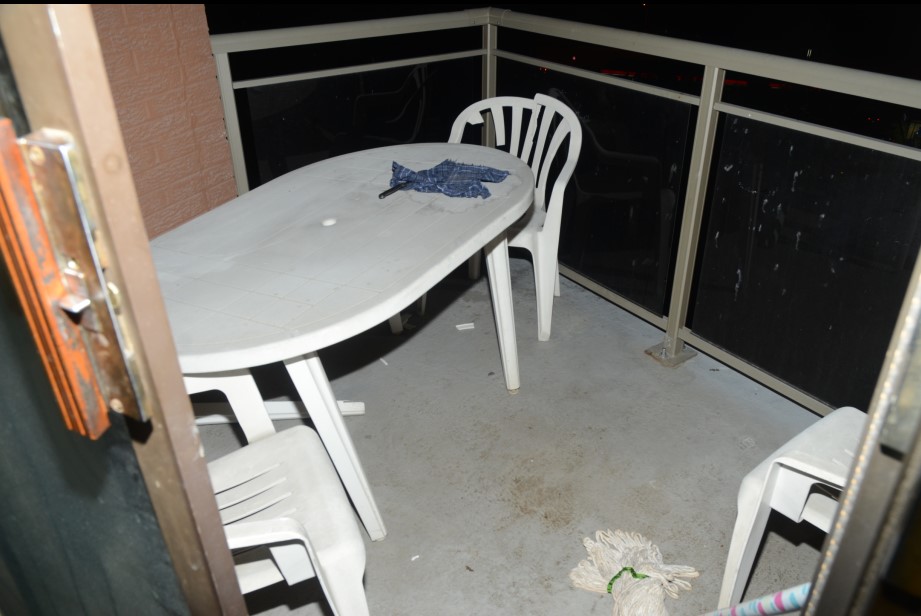 The balcony of the Complainant’s apartment.