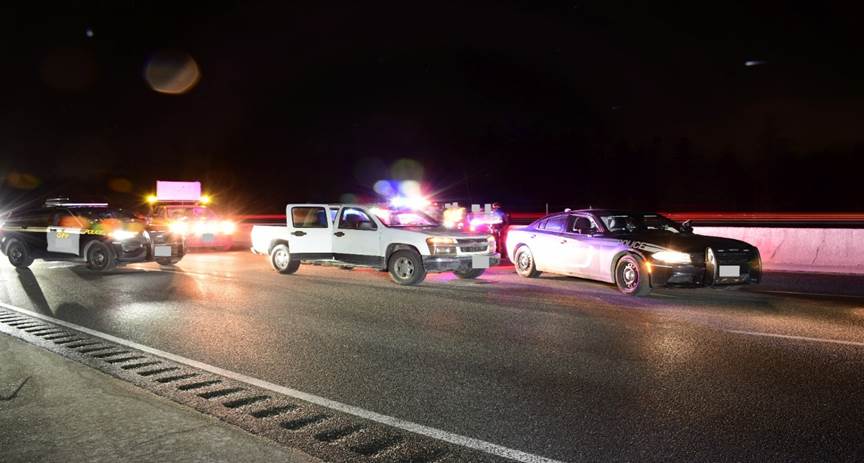 Figure 1 - Police vehicles and Chevrolet Colorado pick-up truck at scene